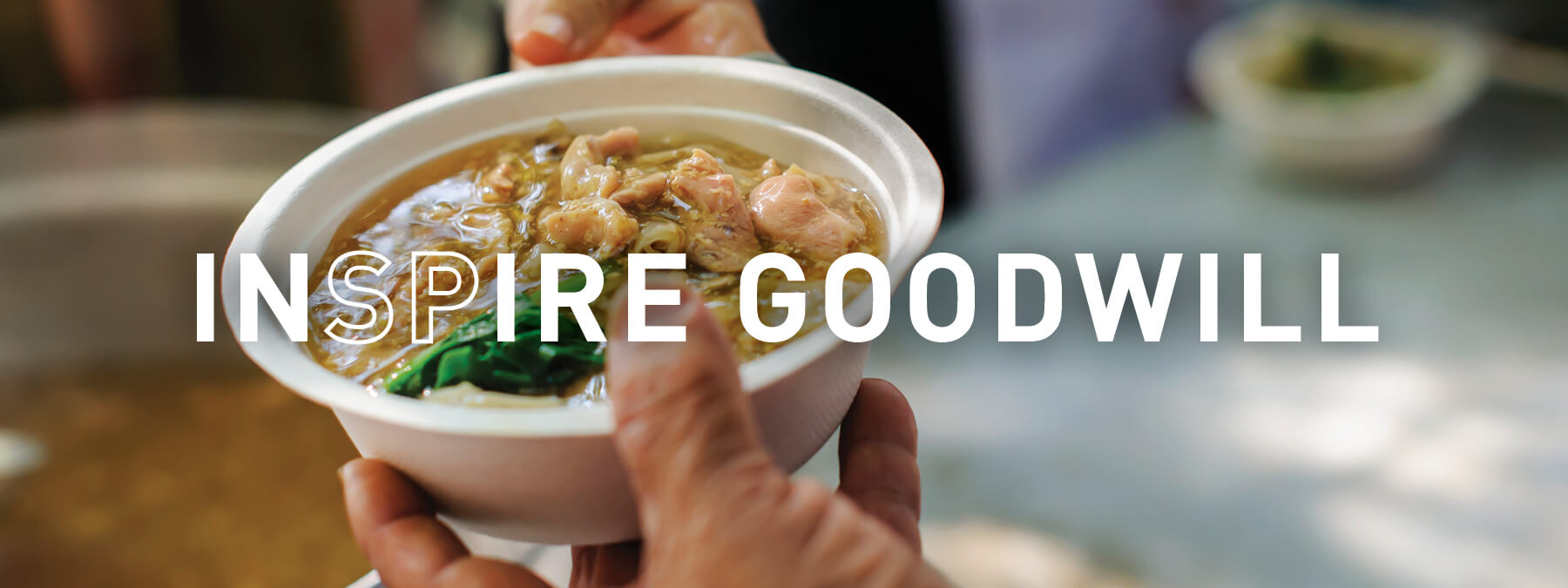 7-INSPIRE-Goodwill INSPIRE goodwill - giving food to someone